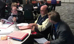 Alan Weyland, Brother Robert Schieler, and Dr. Greg Kopra