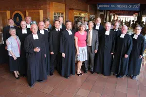 Bill George, center, celebrates his affiliation. Courtesy Brother James Joost, FSC