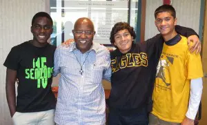 Brother Ghebres with Totino-Grace students