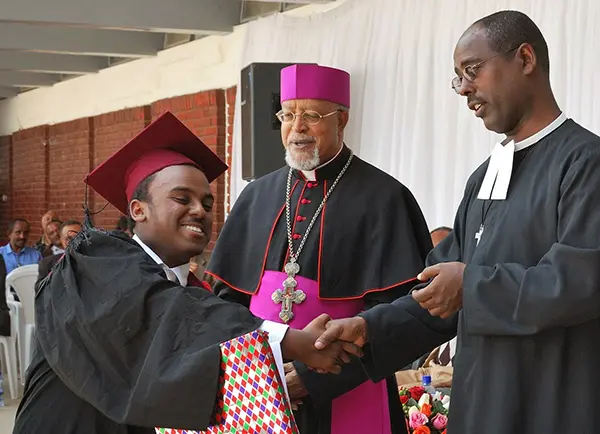 Berhaneyesus Demerew Souraphiel (center) at St. Joseph School.