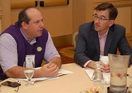 (L-R) Gary Stavrum, board chair, Christian Brothers High School, Memphis, TN, and Jeffery Hazel during Tuesday morning prayer
