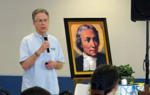 Brother Charles Kitson, FSC, Auxiliary Visitor of the District of Eastern North America, presents to Johnston participants.