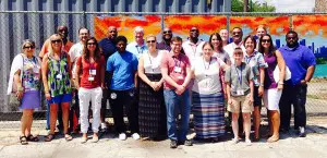 LSJI participants stand with a guest speaker from Precious Blood Ministries, an organization that works with those in the community who have been impacted by violence and conflict. Courtesy James DeHaan