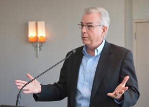 Brother Timothy Coldwell, FSC, greets participants during lunch.