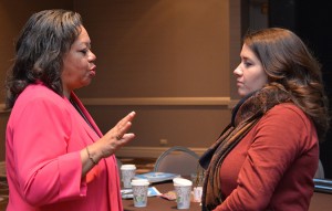 Ellie Cash, right, talks with keynote presenter, the Honorable Susan D. Page, after the address. 